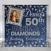 Birthday celebration backdrop featuring ’Denim & Diamonds 50th’ text with sparkly blue decorative elements.