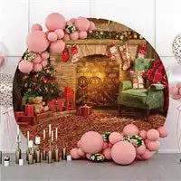 Circular photo backdrop featuring a cozy fireplace scene decorated with pink balloons and floral accents.