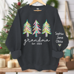 Lofaris Grandma Est Christmas trees color paint And Grandkids Names Sweatshirt