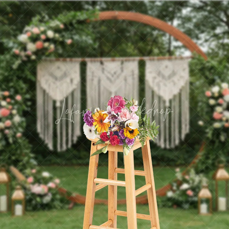 Lofaris Boho Macrame Floral Greenery Arch Photography Backdrop with Lanterns for Wedding Ceremony and Outdoor Event Decor
