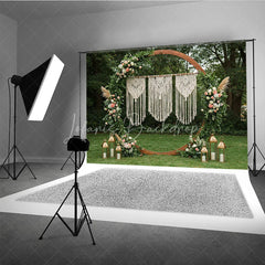 Lofaris Boho Macrame Floral Greenery Arch Photography Backdrop with Lanterns for Wedding Ceremony and Outdoor Event Decor