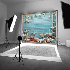 Lofaris Coastal Christmas Photography Backdrop Beach Theme with Starfish and Ornaments Blue Wood Wall Holiday Photo Prop