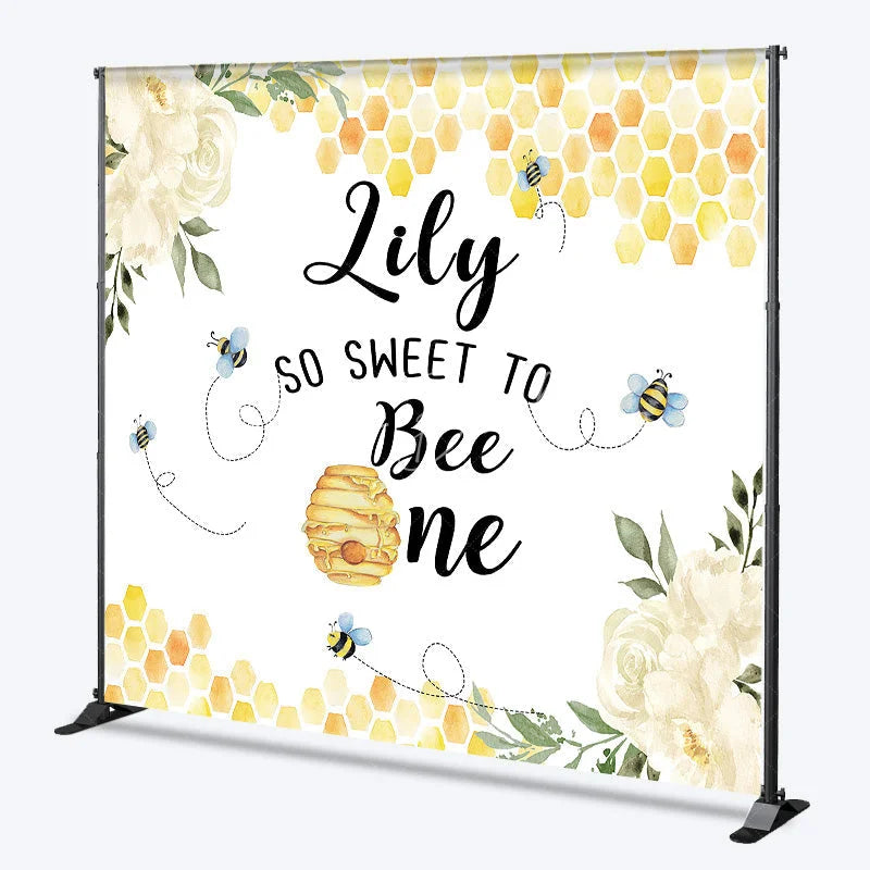 Lofaris Custom Bee and Honeycomb First Birthday Backdrop Personalized So Sweet to Be One with White Flowers