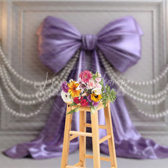 Lofaris Elegant Lavender Satin Bow and Pearl Strands Photography Backdrop White Paneled Wall with Gold Chandeliers