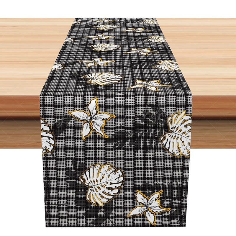 Lofaris Elegant Plaid Table Runner with Black and Gold Palm Leaves for Modern Glam Holiday Dining Decor