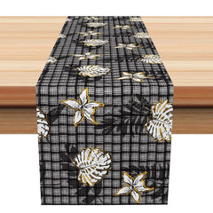 Lofaris Elegant Plaid Table Runner with Black and Gold Palm Leaves for Modern Glam Holiday Dining Decor