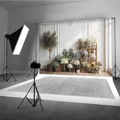 Lofaris Elegant White Paneled Wall with Olive Tree and Floral Arrangements Photography Backdrop Natural Light Studio Decor