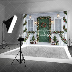 Lofaris Festive Christmas Porch Holiday Backdrop with Green Door Snowy Garlands Wreath and Warm Lights