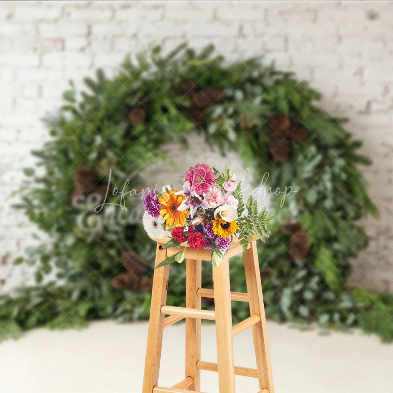 Lofaris Green Evergreen Wreath and Pinecone Holiday Backdrop Rustic Winter Christmas Party Decor on White Brick Wall