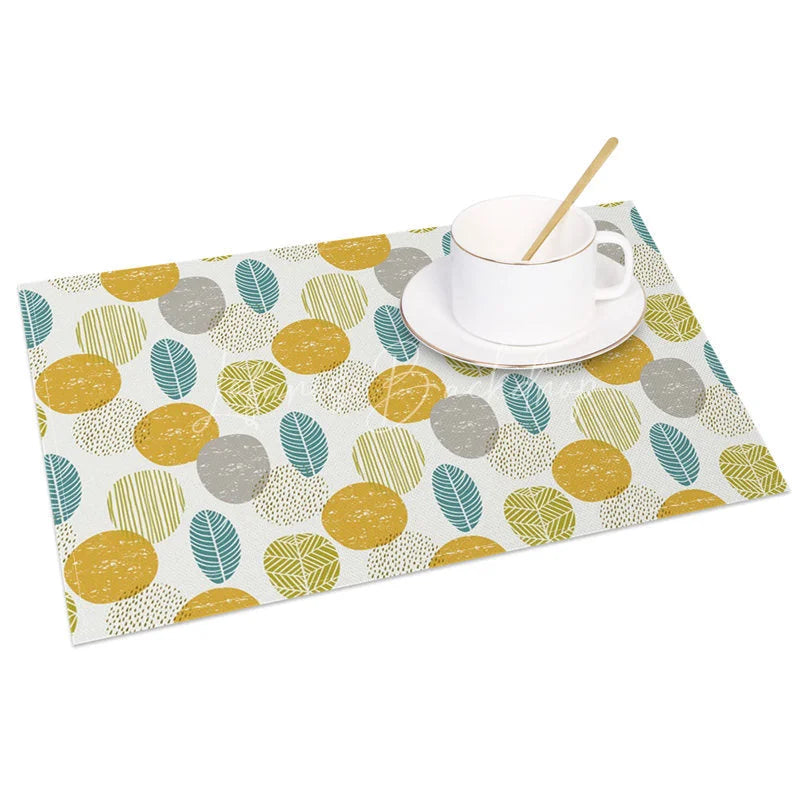 Lofaris Modern Yellow Circle and Green Leaves Set of 4 Placemats for Contemporary Botanical Kitchen Decor