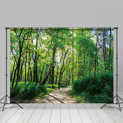 Lofaris Mystical Forest Path Vibrant Green Foliage Backdrop