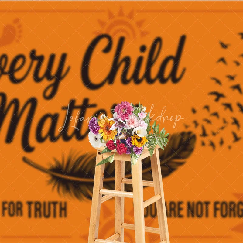 Lofaris Orange and Black Every Child Matters Holiday Backdrop featuring a feather flying birds footprints