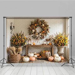 Lofaris Rustic Autumn Photography Backdrop with Sunflowers Pumpkins and a Festive Fall Wreath White Brick Wall Decor