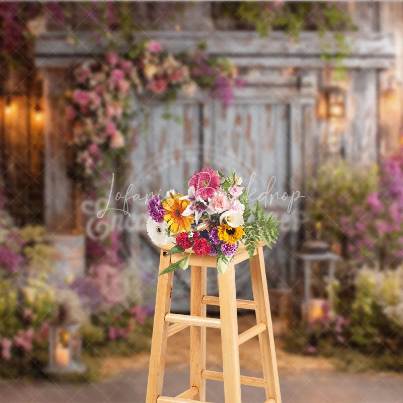 Lofaris Rustic Wooden Barn Door Photography Backdrop with Pink and Purple Floral Arrangements Enchanted Garden String Lights