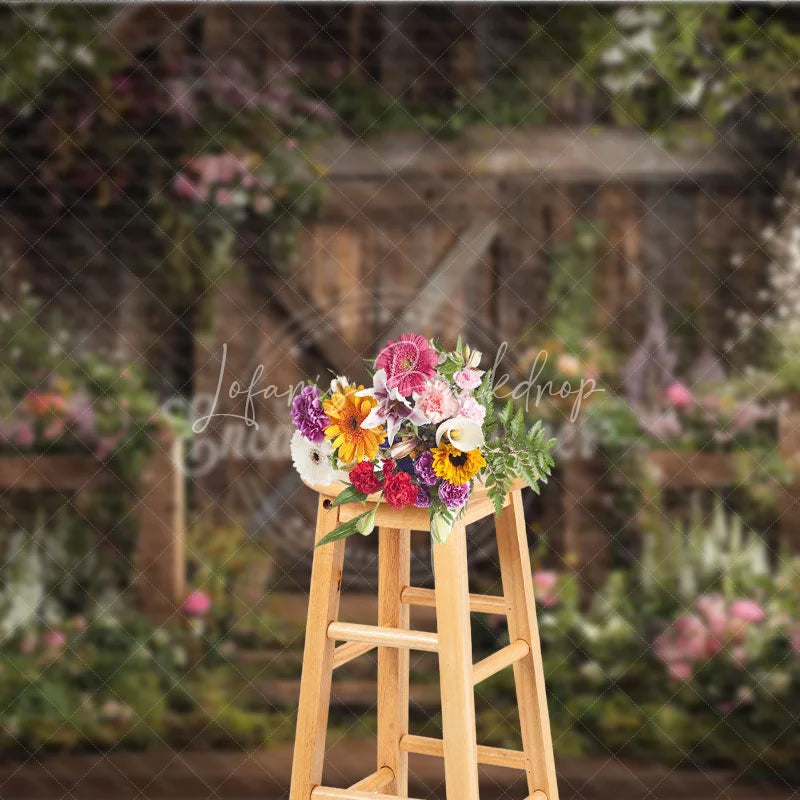 Lofaris Rustic Wooden Barn Door with Lush Floral Garden Photography Backdrop Enchanting Spring or Wedding Decor
