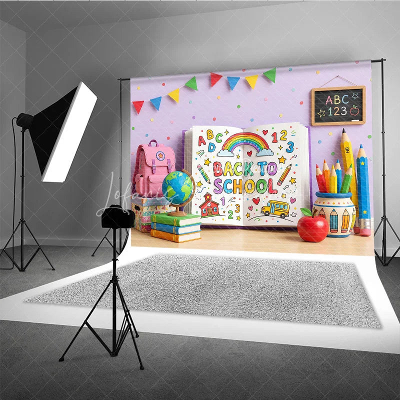 Lofaris Vibrant Back to School Photography Backdrop featuring a Colorful Open Book with Rainbow and Supplies
