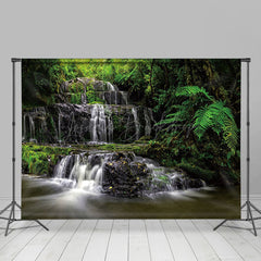 Lofaris Waterfall Scene Luxuriant Green Vegetation Backdrop