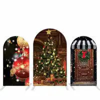 Three decorative holiday archways featuring a moon and stars, a Christmas tree, and a wreath-adorned door.
