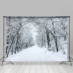 Lofaris White And Snowy Highway With Trees Winter Backdrop