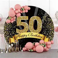 Decorative 50th birthday display with gold glitter numbers, pink balloons and floral accents.