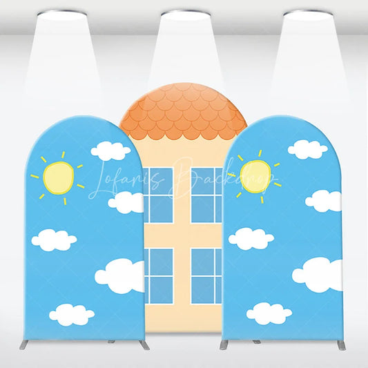 Lofaris Bright Cartoon House and Blue Sky with Clouds Arch Backdrop Kit Playful Sun Windows Design for Kids’ Party