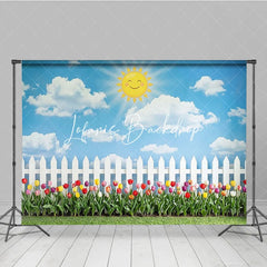 Lofaris Cheerful Blue Sky with Smiling Sun Picket Fence and Colorful Tulips Photography Backdrop Spring Garden Party Decor