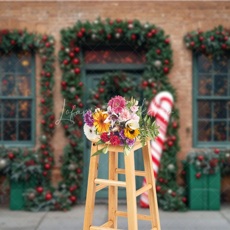 Lofaris Christmas Storefront Backdrop Brick Wall with Giant Candy Cane Green Door Wreaths Holiday Photo Props