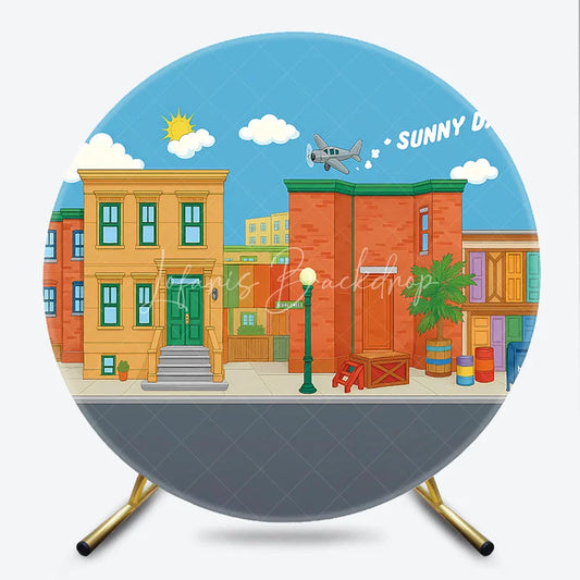 Lofaris Colorful Cartoon City Street Round Backdrop with Sunny Days Sky Neighborhood Buildings and Flying Airplane.