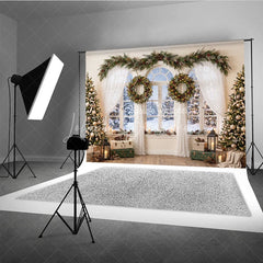 Lofaris Cozy Snowy Window Holiday Backdrop Christmas Trees Festive Garland and Illuminated Wreaths Winter Scene Decor