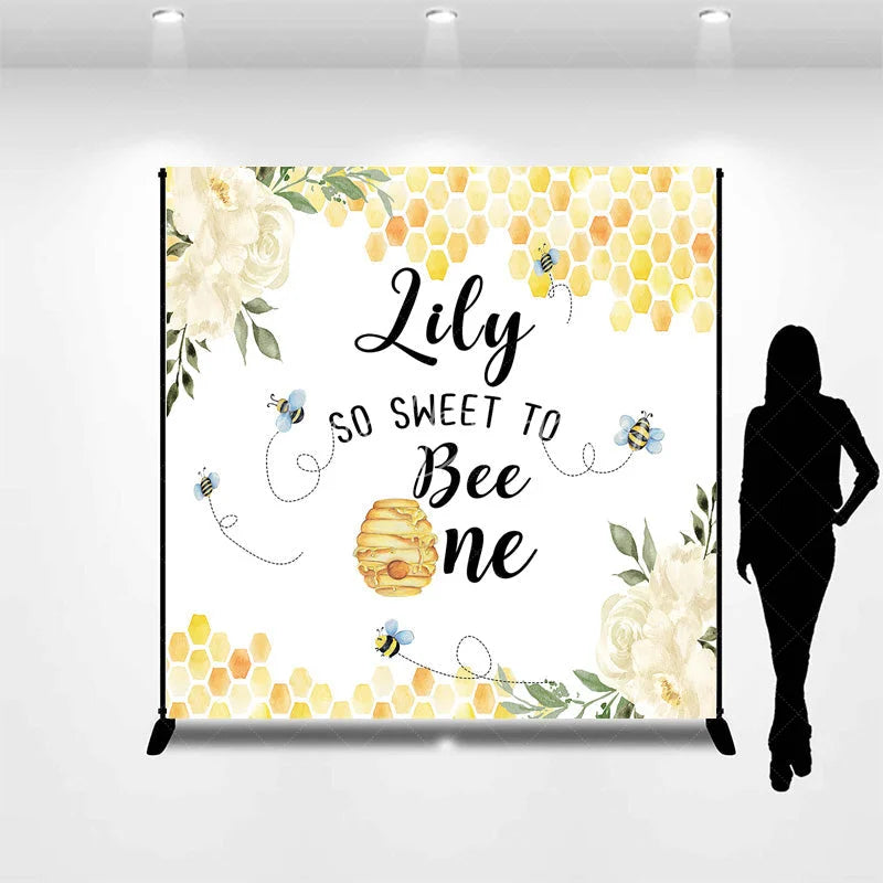 Lofaris Custom Bee and Honeycomb First Birthday Backdrop Personalized So Sweet to Be One with White Flowers