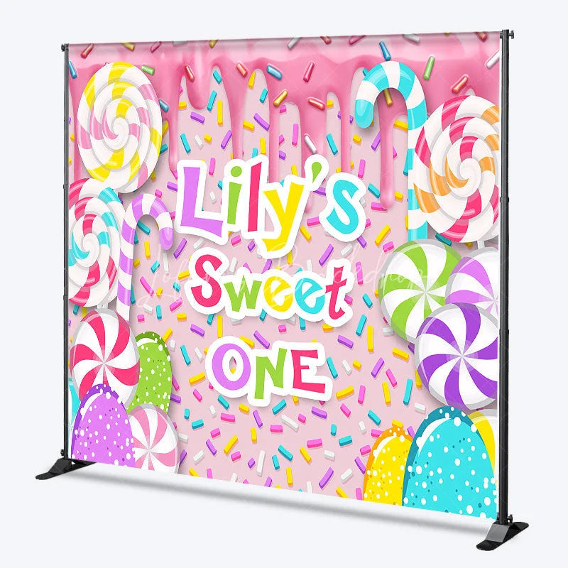 Lofaris Custom Sweet One First Birthday Backdrop Pink Candy Land with Colorful Lollipops and Sprinkles Decor