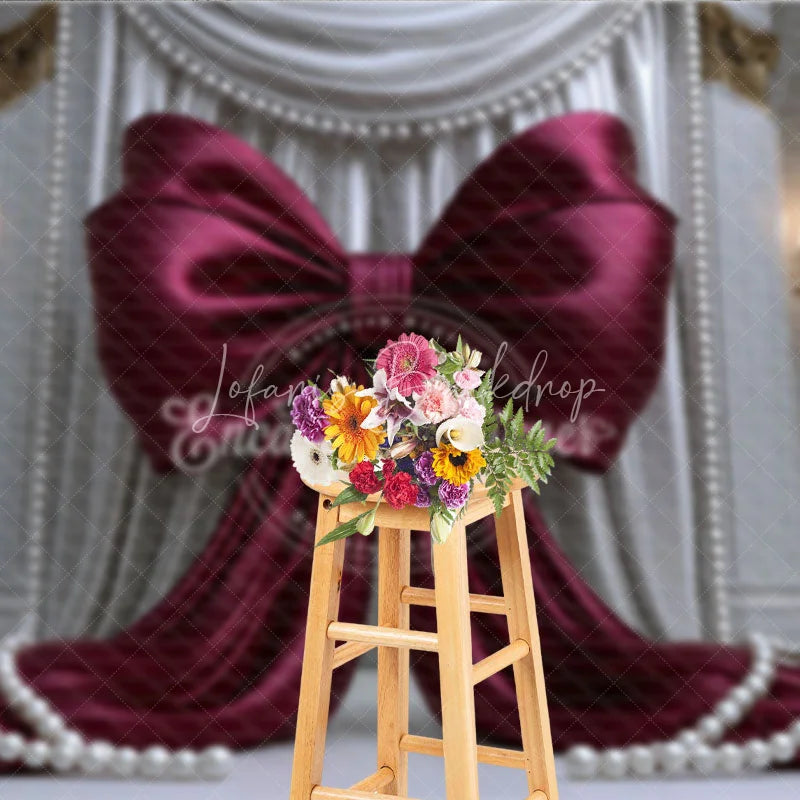 Lofaris Elegant Burgundy Bow with White Drapes and Gold Accents Photography Backdrop Pearl Embellishments for Celebrations