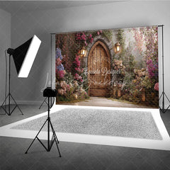 Lofaris Enchanted Garden Photography Backdrop with Arched Wooden Door Lush Flowers and Lanterns for Fairy Tale Theme
