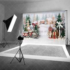 Lofaris Festive Winter Village Holiday Backdrop with Miniature Train Snow Covered Trees and Gift Boxes