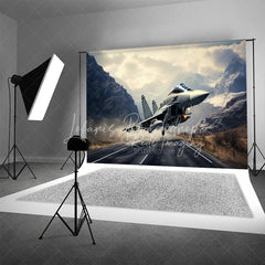 Lofaris Fighter Jet Taking Off over Mountain Road Backdrop Supersonic Aviation Photography Background