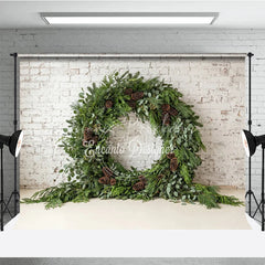 Lofaris Green Evergreen Wreath and Pinecone Holiday Backdrop Rustic Winter Christmas Party Decor on White Brick Wall