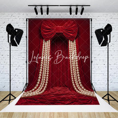 Lofaris Luxurious Red Velvet Curtain Photography Backdrop with Large Bow and Cascading Pearl Strings Elegant Party Decor