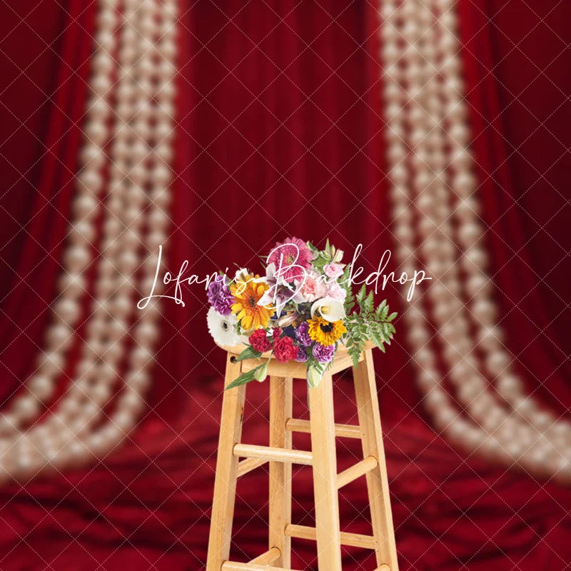 Lofaris Luxurious Red Velvet Curtain Photography Backdrop with Large Bow and Cascading Pearl Strings Elegant Party Decor