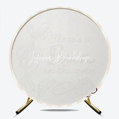 Lofaris Neutral Striped There’s a Bun in the Oven Round Backdrop Baked Goods and Ribbon for Baby Shower Decor.