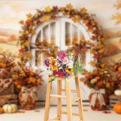 Lofaris Rustic Autumn Photography Backdrop with Fall Leaves Pumpkins and a White Arched Door for Seasonal Decor