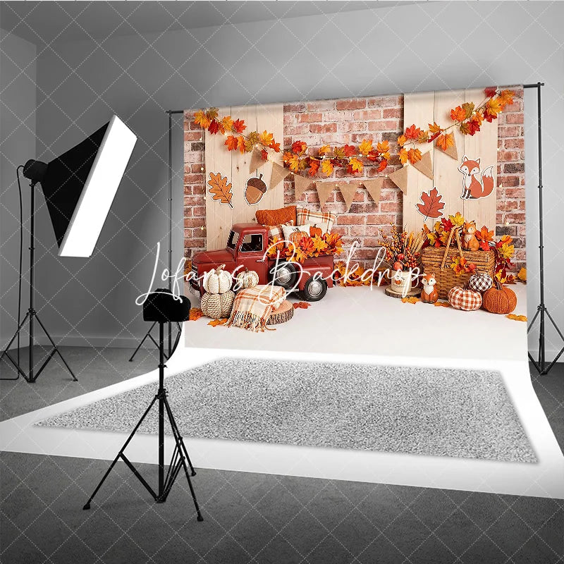 Lofaris Rustic Autumn Red Truck and Pumpkins Photography Backdrop with Brick Wall Maple Leaves Fall Harvest Seasonal Decor