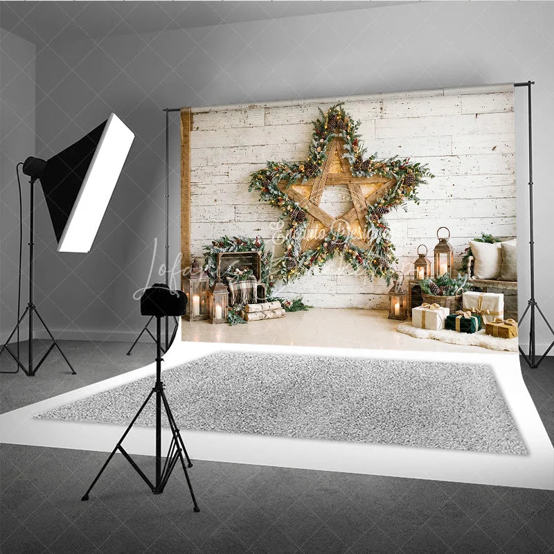 Lofaris Rustic White Wood Wall Holiday Backdrop with a Large Wooden Star Frosted Garland and Cozy Christmas Decor