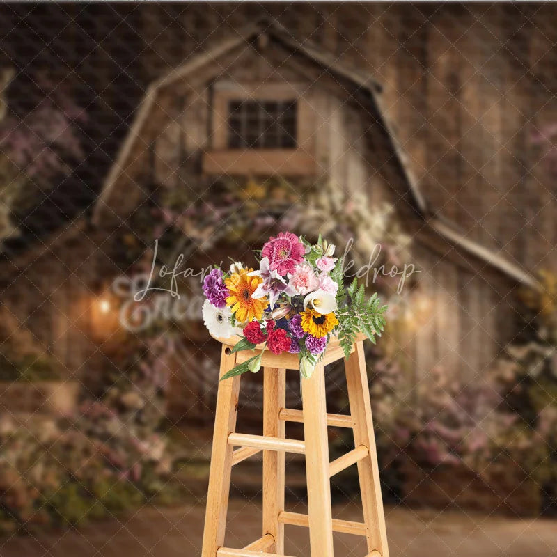 Lofaris Rustic Wooden Barn Photography Backdrop with Floral Arch and Warm Lanterns Enchanting Spring Celebration Decor