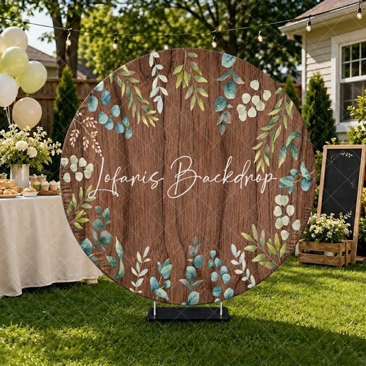 Lofaris Rustic Wooden Round Backdrop with Green Eucalyptus Leaves Elegant Natural Botanical Photo Booth Decor.