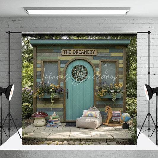 Lofaris Whimsical Rustic Wooden Playhouse Photography Backdrop with Arched Teal Door and Sun Carving Fairy Tale Garden Scene