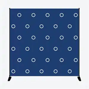 Navy blue backdrop with white circular rings arranged in a grid pattern.
