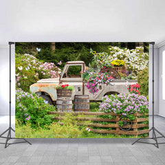 Lofaris Green And Floral Garden With A Truck Spring Backdrop